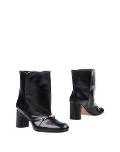 Полусапоги и высокие ботинки Céline