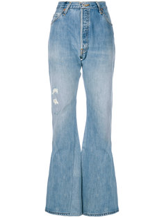 расклешенные джинсы с рваными деталями Re/Done