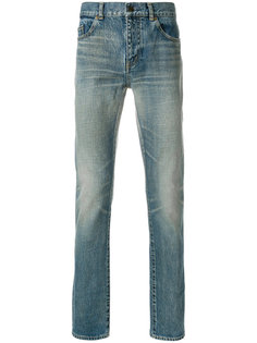 облегающие джинсы с потертой отделкой Saint Laurent