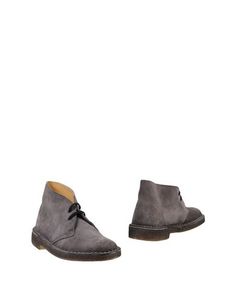 Полусапоги и высокие ботинки Clarks