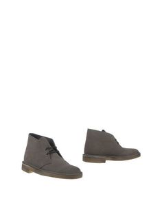 Полусапоги и высокие ботинки Clarks