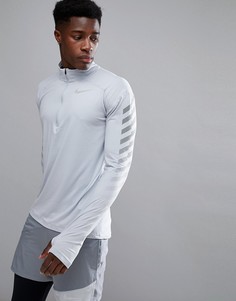 Серый свитшот с молнией 1/4 и светоотражающей отделкой Nike 859199-012 - Серый