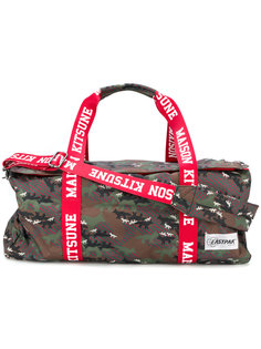 camouflage print duffle bag Maison Kitsuné