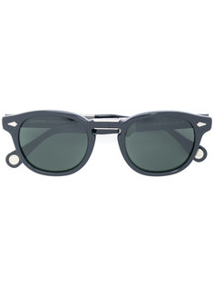 folded arms sunglasses Moscot