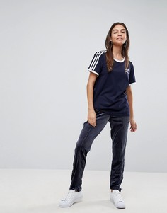 Темно-синие бархатные спортивные штаны adidas Originals Firebird - Синий