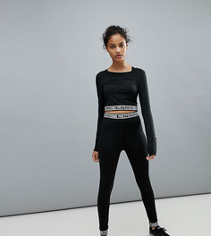 Спортивные леггинсы с логотипом PrettyLittleThing - Черный