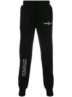 спортивные брюки с заплаткой с логотипом Rta