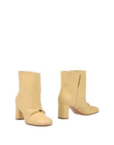 Полусапоги и высокие ботинки Céline