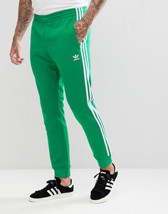 Зеленые джоггеры adidas Originals adicolor Superstar CW1278 - Зеленый