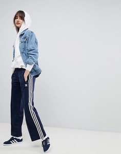 Темно-синие широкие брюки adidas Originals - Темно-синий