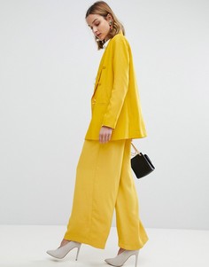 Широкие брюки со складками на талии River Island - Желтый
