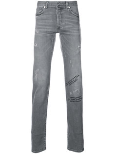 джинсы с принтом и рваными деталями Dior Homme