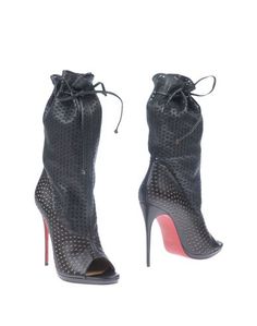 Полусапоги и высокие ботинки Christian Louboutin