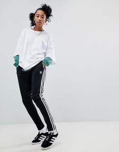 Черные спортивные штаны с тремя полосками по бокам adidas Originals adicolor - Черный