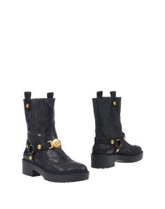 Полусапоги и высокие ботинки Versace