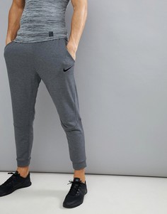 Суженные книзу темно-серые флисовые брюки Nike Training 860371-071 - Серый
