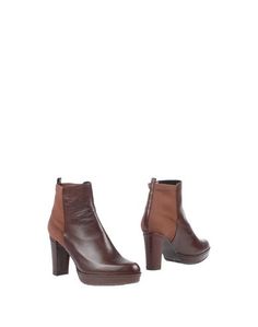 Полусапоги и высокие ботинки Stuart Weitzman