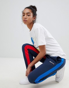 Спортивные штаны с контрастными полосами по бокам Ellesse Heritage - Темно-синий