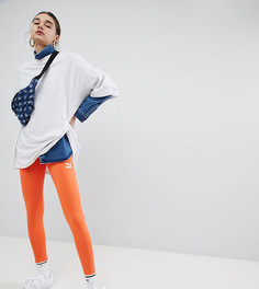 Оранжевые леггинсы с фирменной полосой по бокам Puma эксклюзивно для ASOS - Оранжевый