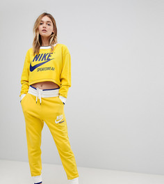 Желтые спортивные штаны Nike эксклюзивно для ASOS Archive - Желтый