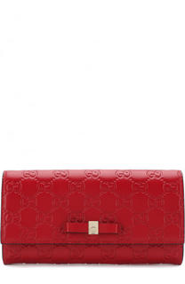 Кожаный кошелек с тиснением Signature с клапаном Gucci