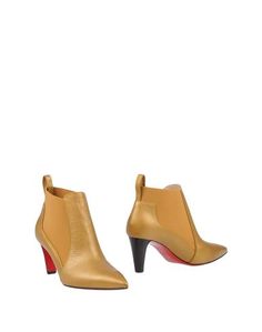 Полусапоги и высокие ботинки Christian Louboutin