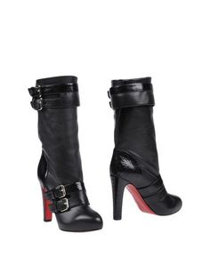 Полусапоги и высокие ботинки Christian Louboutin