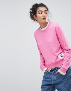 Свитшот с круглым вырезом и нашивкой с логотипом Calvin Klein Jeans - Розовый