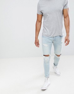 Светлые джинсы скинни с рваной отделкой Hollister - Синий
