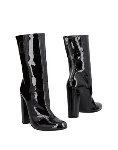 Полусапоги и высокие ботинки Courrèges