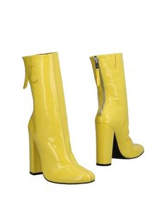 Полусапоги и высокие ботинки Courrèges