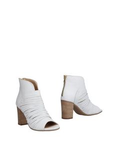 Полусапоги и высокие ботинки Manas