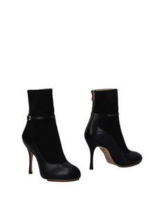 Полусапоги и высокие ботинки Charlotte Olympia