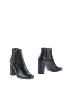 Полусапоги и высокие ботинки Saint Laurent