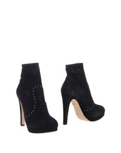 Полусапоги и высокие ботинки Charlotte Olympia