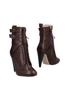 Полусапоги и высокие ботинки Cavallini