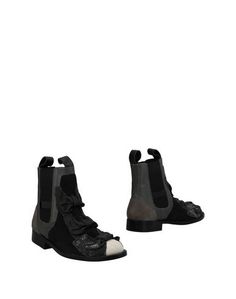 Полусапоги и высокие ботинки Comme des Garcons