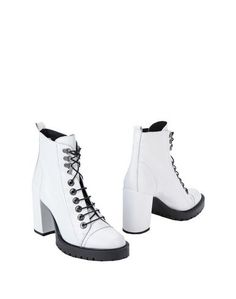 Полусапоги и высокие ботинки Pierre DarrÉ