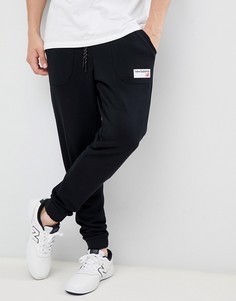 Черные джоггеры с логотипом New Balance MP83515_BK - Черный