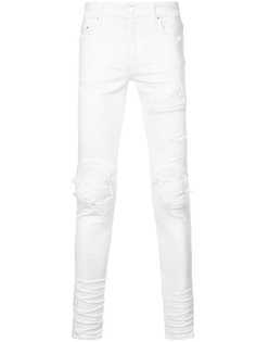 облегающие джинсы с потертостями Amiri