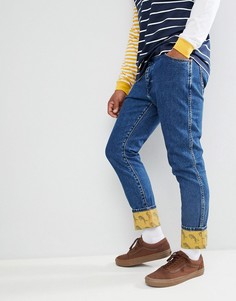 Сине-желтые брюки слим Wrangler - Темно-синий
