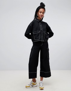 Черные широкие брюки с карманами карго и контрастными строчками Monki - Черный