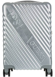 Маленький чемодан серебристого цвета на колесах Guess