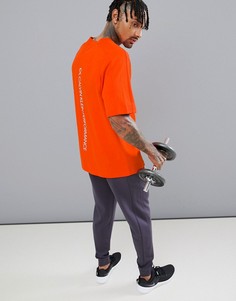 Футболка с логотипом на спине Calvin Klein Performance - Оранжевый