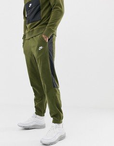 Зеленые джоггеры с полосками по бокам Nike 929126-395 - Зеленый