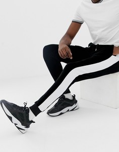 Супероблегающие велюровые джоггеры с полосками по бокам ASOS DESIGN - Черный