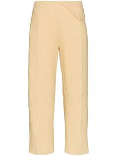 Jacquemus брюки с декором на поясе и складками спереди