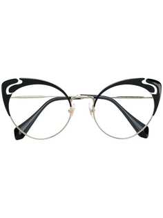 Miu Miu Eyewear очки в оправе кошачий глаз с вырезными деталями