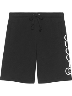 Gucci Shorts with Gucci logo print