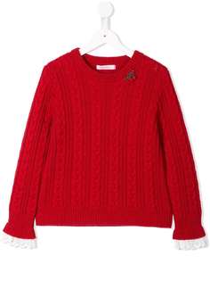 Familiar cable knit sweater